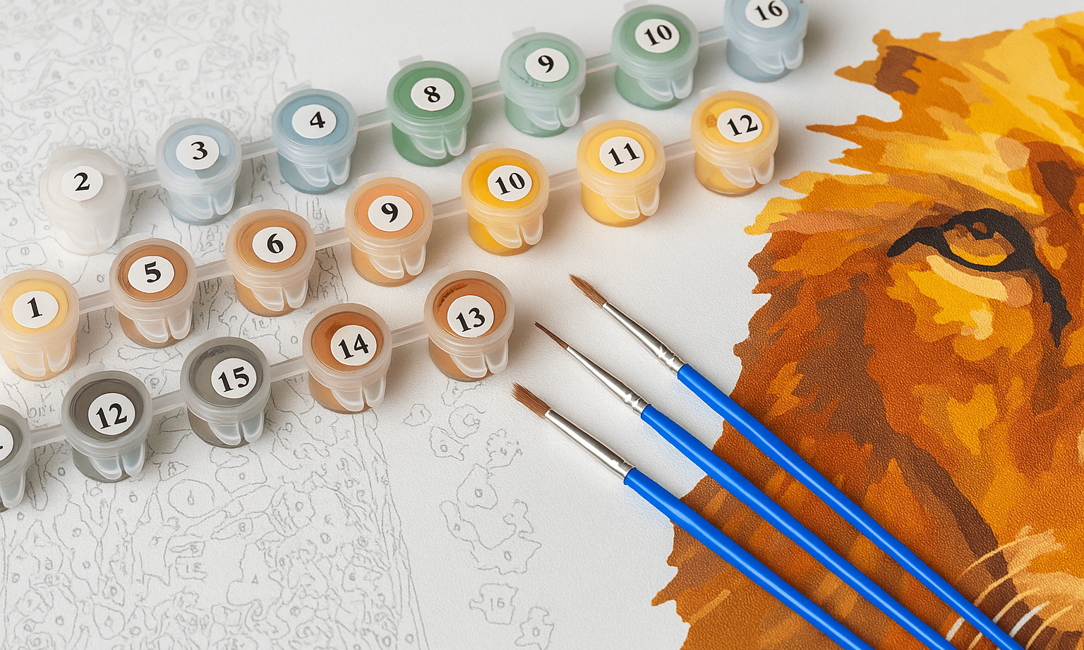Goedkope schilderen op nummer set met potjes verf, penselen en een canvas met leeuw in warme kleuren.