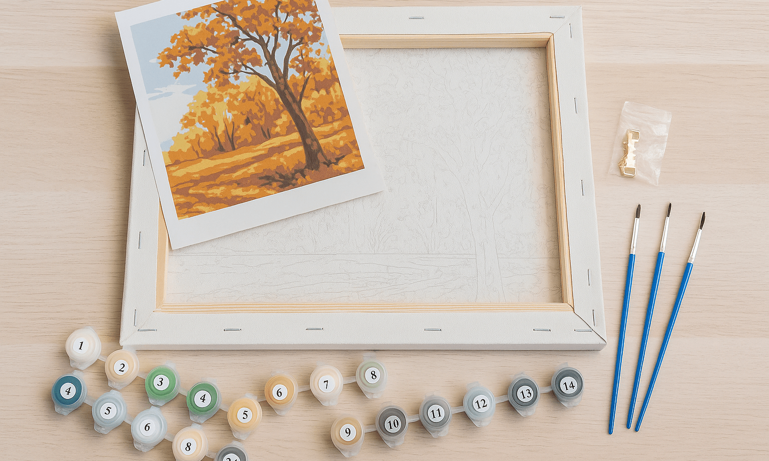 Schilderen op nummer pakket met canvas, penselen, genummerde verf en voorbeeldafbeelding op een houten ondergrond.